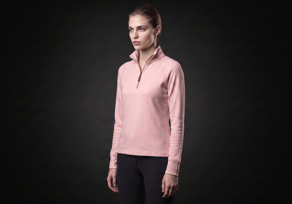 Velmurax women's thermal riding shirt in pink, in a three-quarter view on the model on the studio set