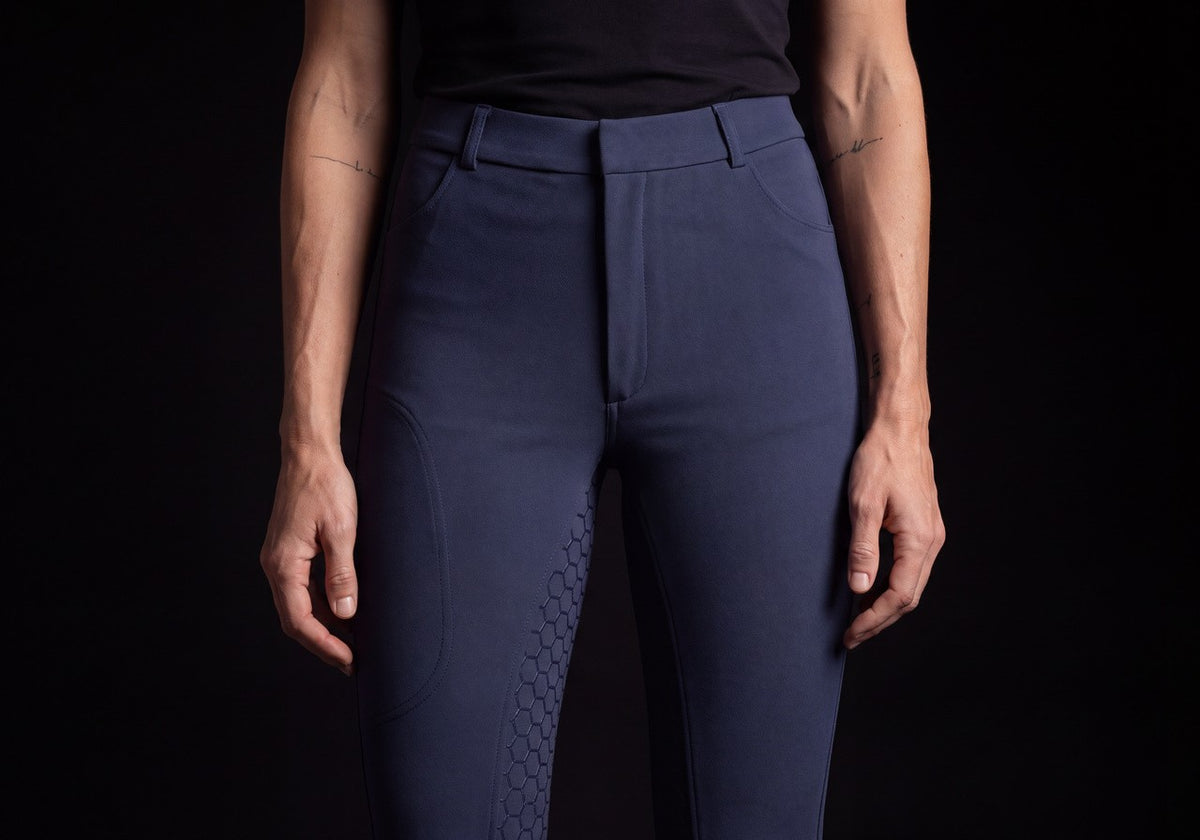 Navy full-seat riding breeches with silicone knee grip, front view