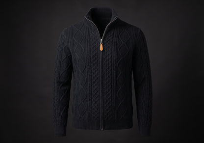 Velmurax cable knit zip cardigan in black, on its own on the dark studio set