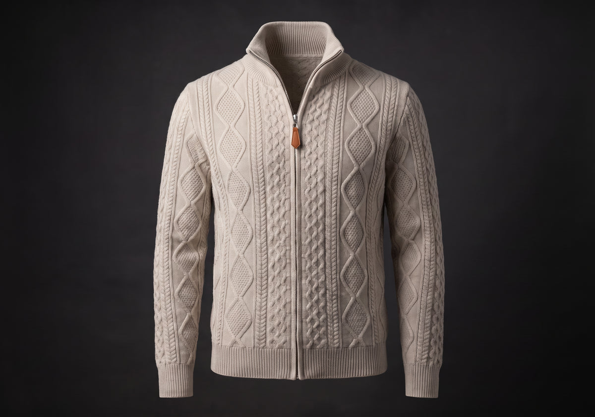 Velmurax cable knit zip cardigan in oatmeal, on its own on the dark studio set
