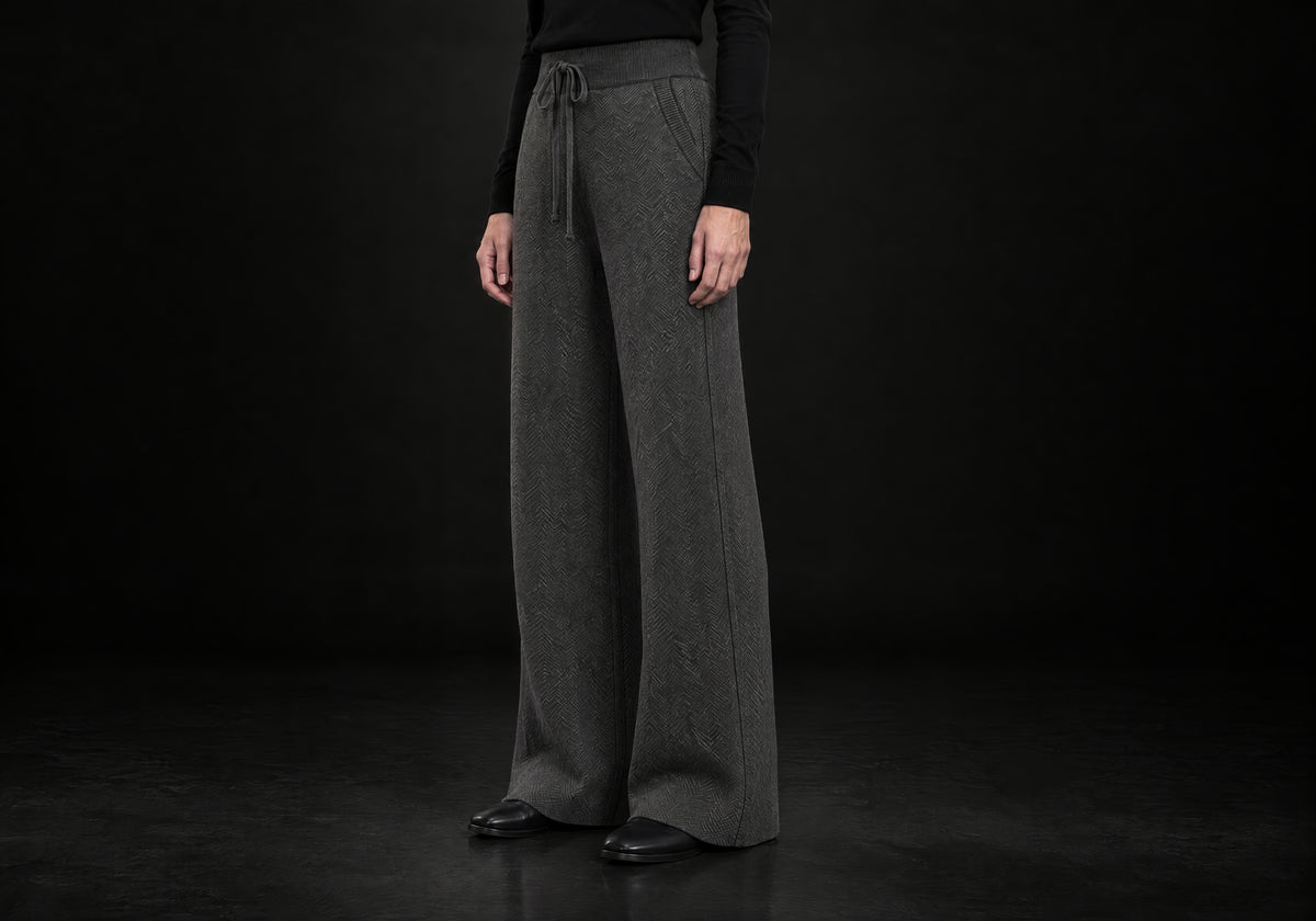 Velmurax Cashmere Wide-Leg Pants in charcoal with side pocket and full-length wide leg, three-quarter view on a model
