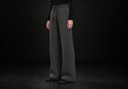 Velmurax Cashmere Wide-Leg Pants in charcoal with side pocket and full-length wide leg, three-quarter view on a model