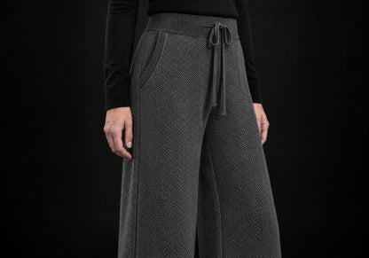 Velmurax Cashmere Wide-Leg Pants in charcoal, close-up of the herringbone knit, drawstring and ribbed waistband