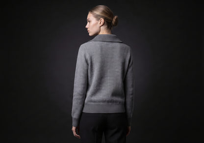 Velmurax cashmere zip cardigan in gray, seen from the back on the model, showing the back of the garment