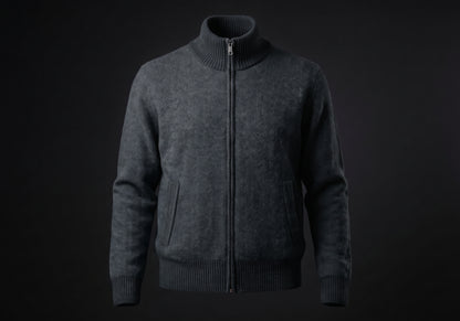Velmurax cashmere zip cardigan in charcoal, on its own on the dark studio set
