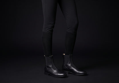 Velmurax cowhide paddock boots in black, worn, front three-quarter