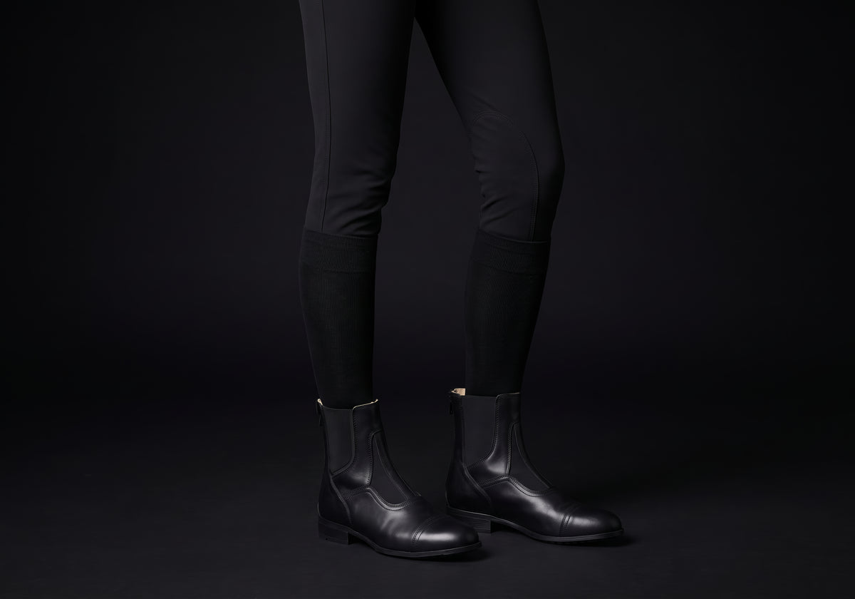 Velmurax cowhide paddock boots in black, worn, front three-quarter