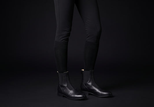 Velmurax cowhide paddock boots in black, worn, front three-quarter