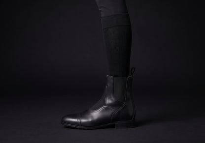 Velmurax cowhide paddock boots in black, worn, in side profile