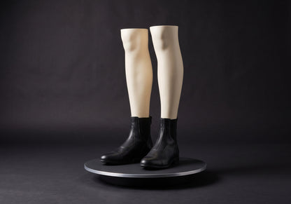 Velmurax cowhide paddock boots in black, on a display mannequin on the studio turntable