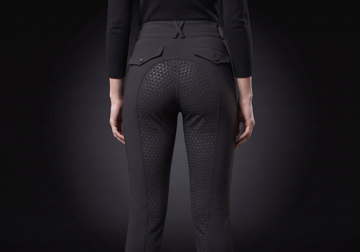 Velmurax fleece-lined winter riding pants in black, worn, seen from the back