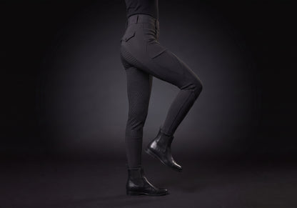 Velmurax fleece-lined winter riding pants in black, worn, in side profile
