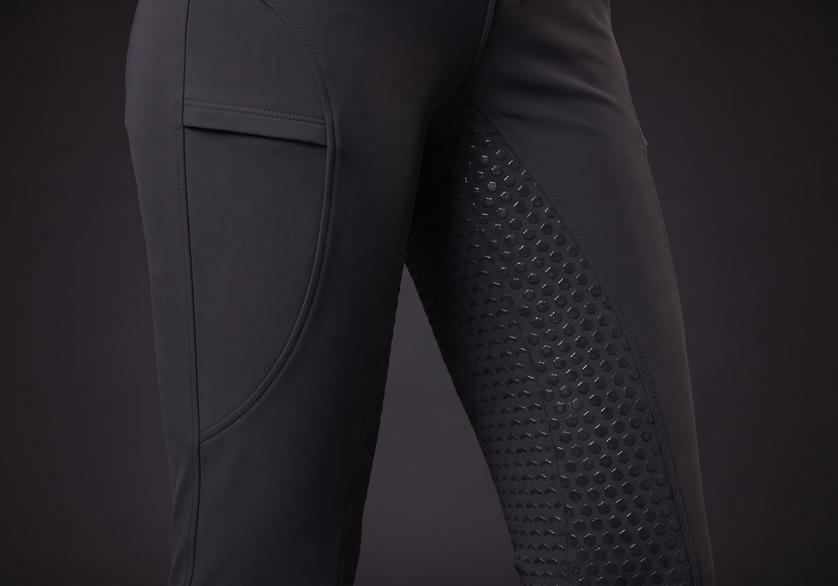 Velmurax fleece-lined winter riding pants in black, the grip on the inner leg up close