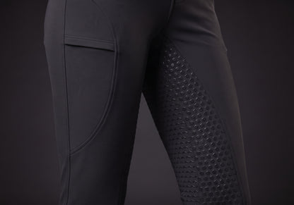 Velmurax fleece-lined winter riding pants in black, the grip on the inner leg up close