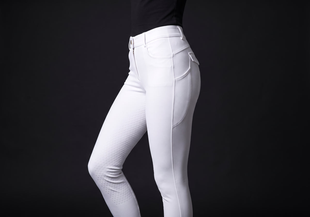 Velmurax full-seat riding breeches in white, worn, in side profile