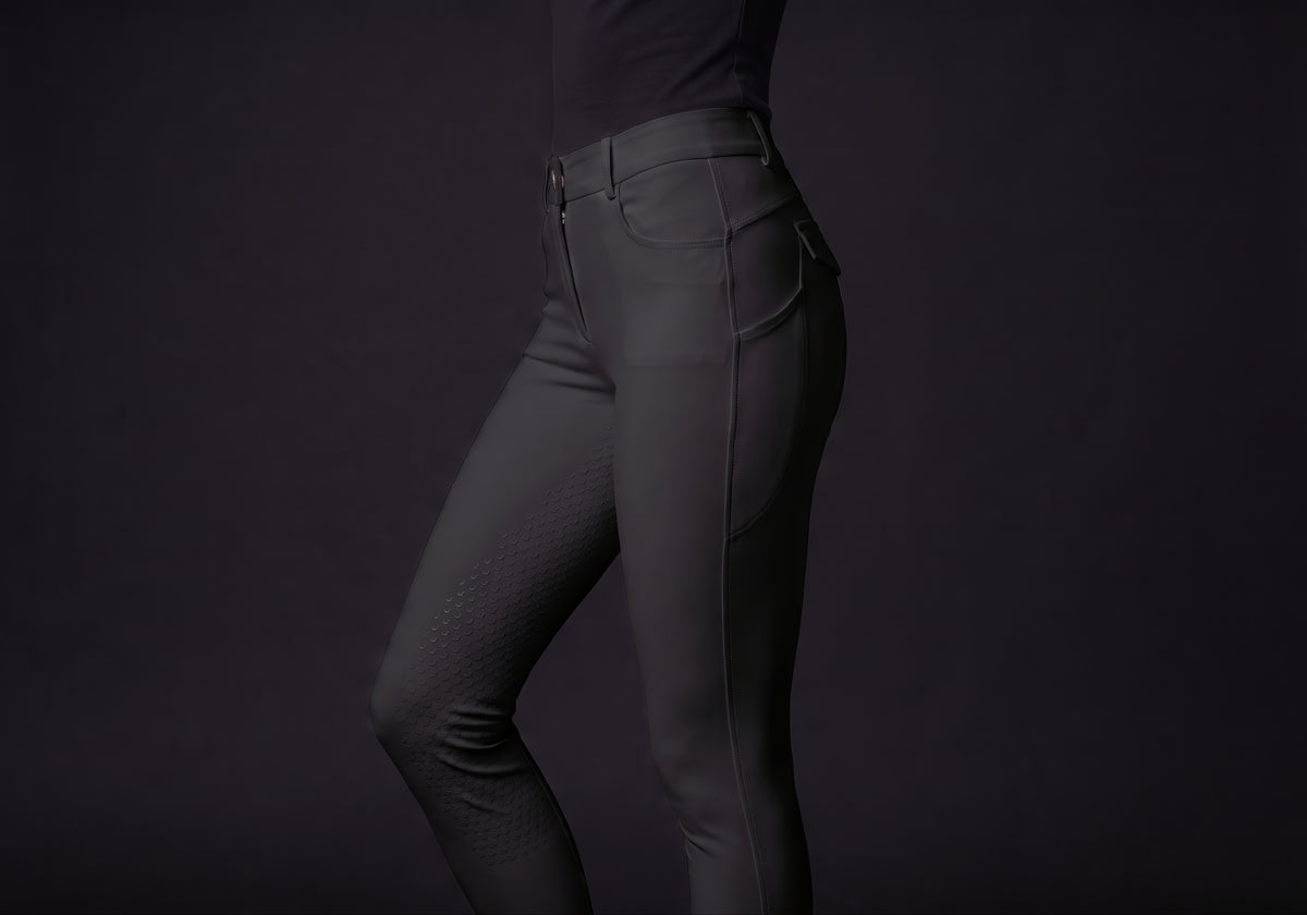 Velmurax full-seat riding breeches in black, worn, in side profile