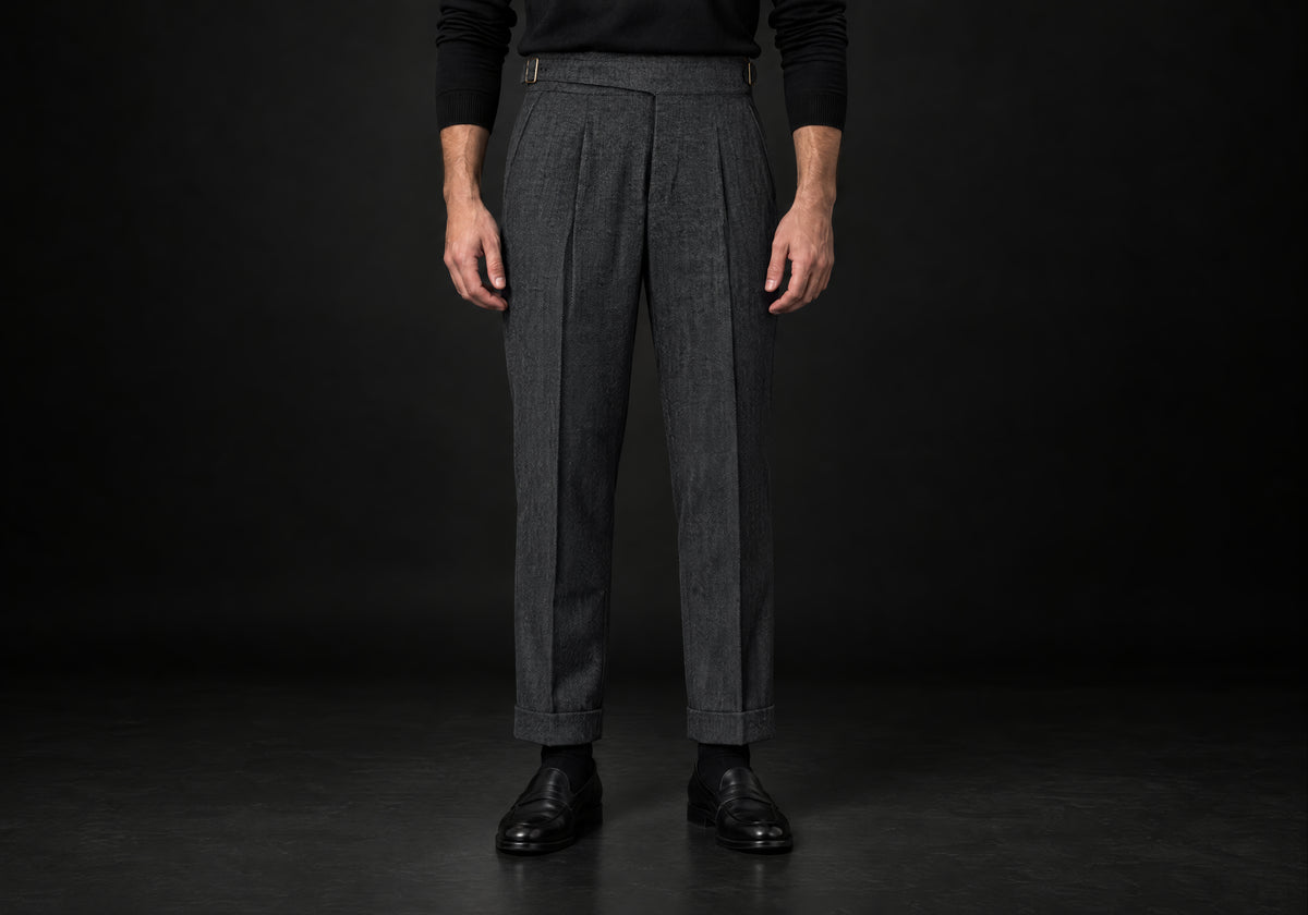 Velmurax Herringbone Wool-Blend Pants in dark gray with front pleats and cuffed hems, front view on a model