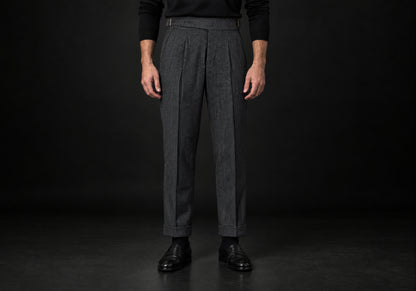 Velmurax Herringbone Wool-Blend Pants in dark gray with front pleats and cuffed hems, front view on a model