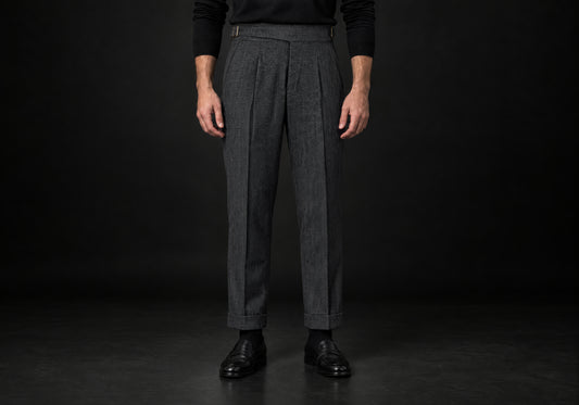 Velmurax Herringbone Wool-Blend Pants in dark gray with front pleats and cuffed hems, front view on a model