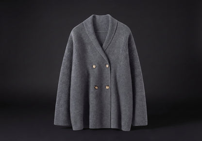Velmurax knit cashmere coat in dark gray, on its own on the dark studio set