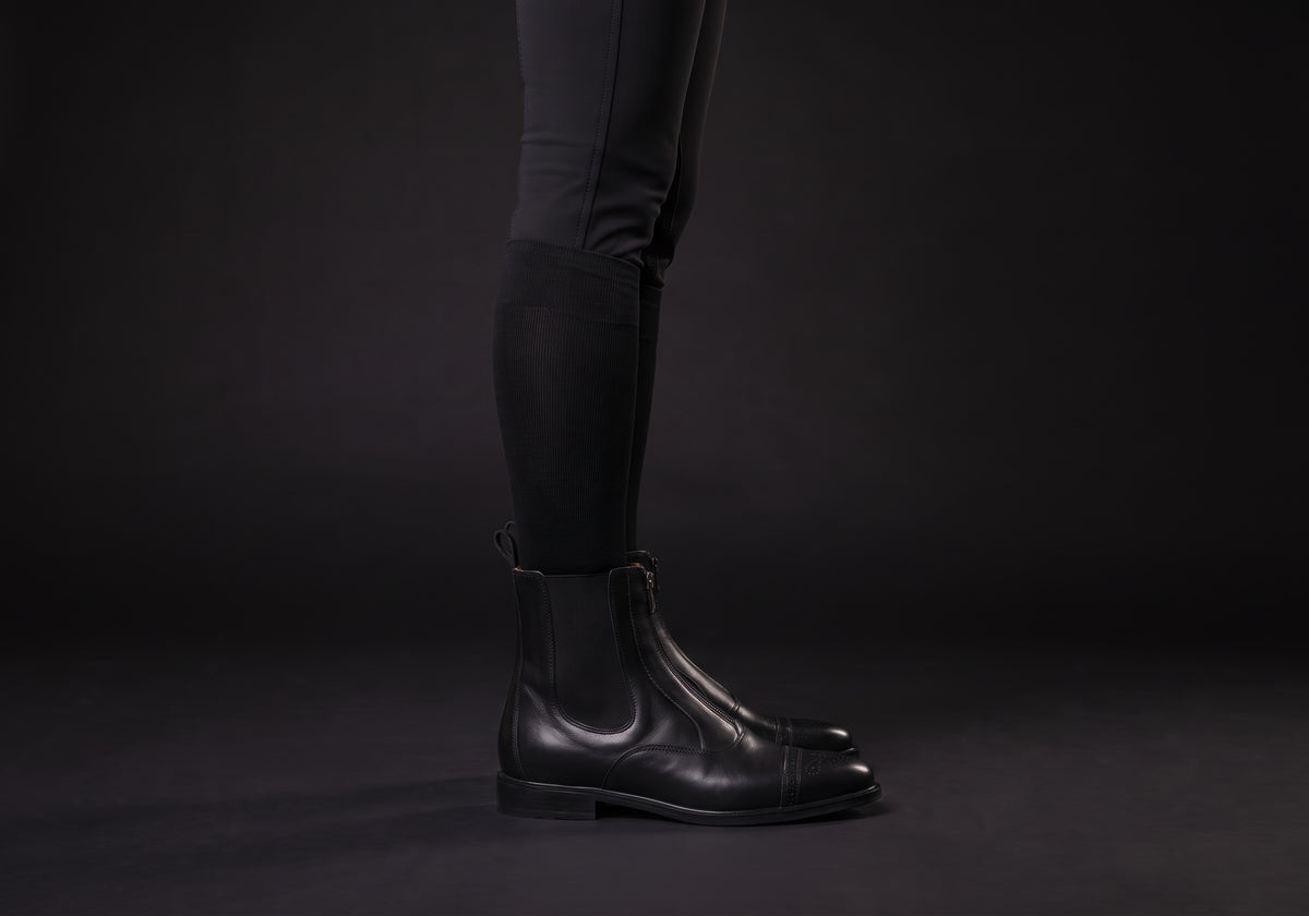 Velmurax leather paddock boots in black, worn, in side profile