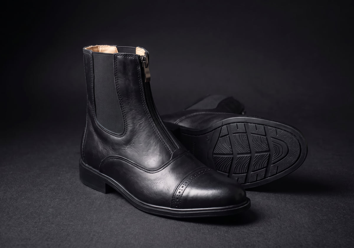 Velmurax leather paddock boots in black, showing the outsole and heel