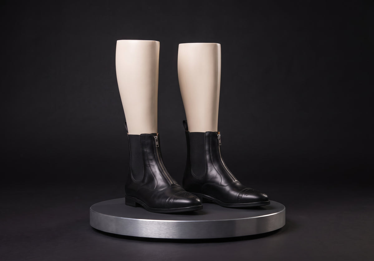 Velmurax leather paddock boots in black, on a display mannequin on the studio turntable