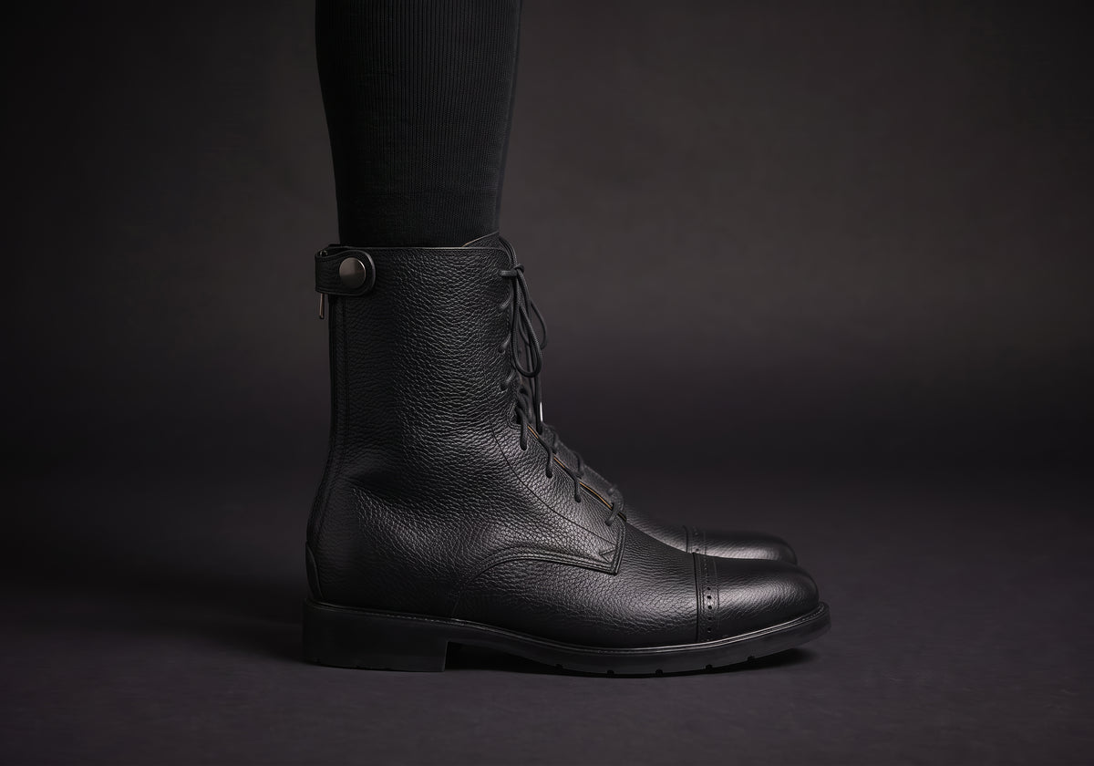 Velmurax leather paddock boots in black, worn, in side profile