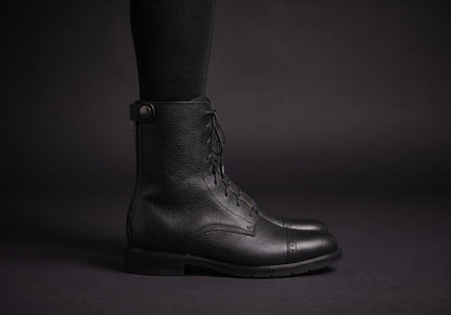 Velmurax leather paddock boots in black, worn, in side profile