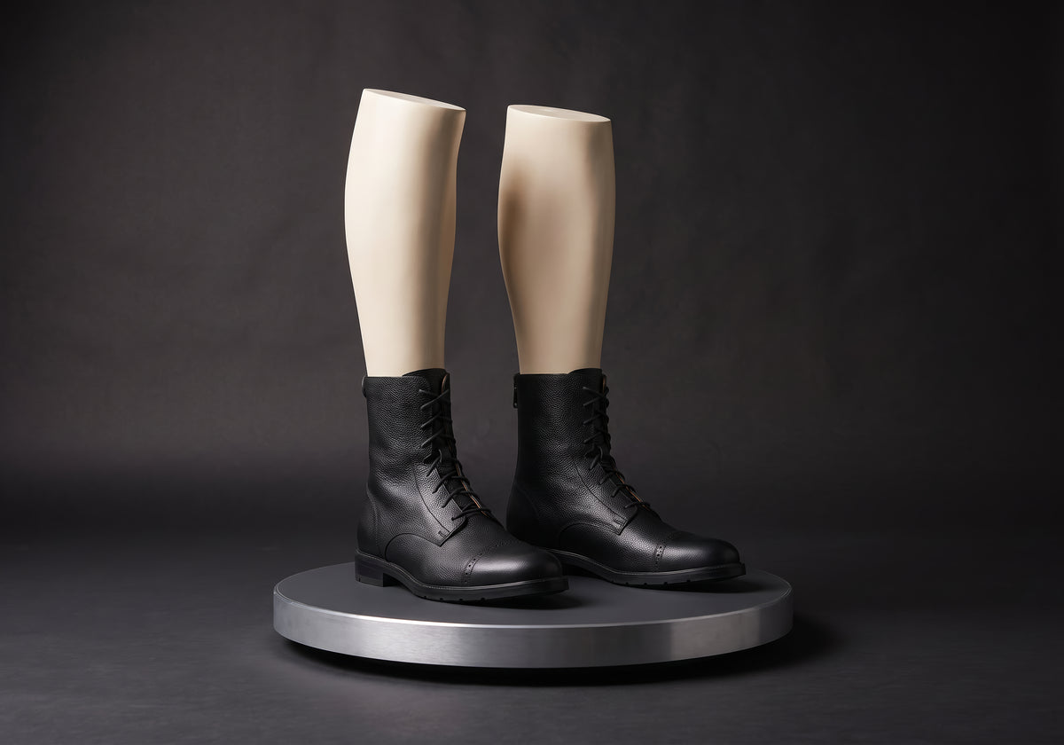 Velmurax leather paddock boots in black, on a display mannequin on the studio turntable