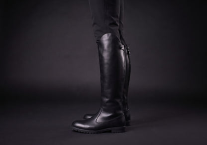 Velmurax men's knee-high riding boots in black, worn, in side profile