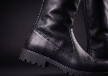 Velmurax men's knee-high riding boots in black, the closure up close, worn