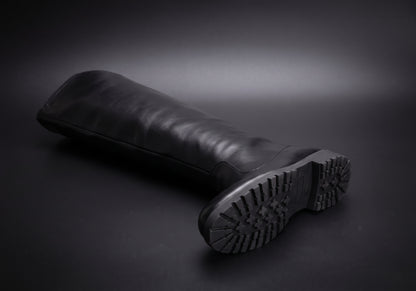 Velmurax men's knee-high riding boots in black, showing the outsole and heel