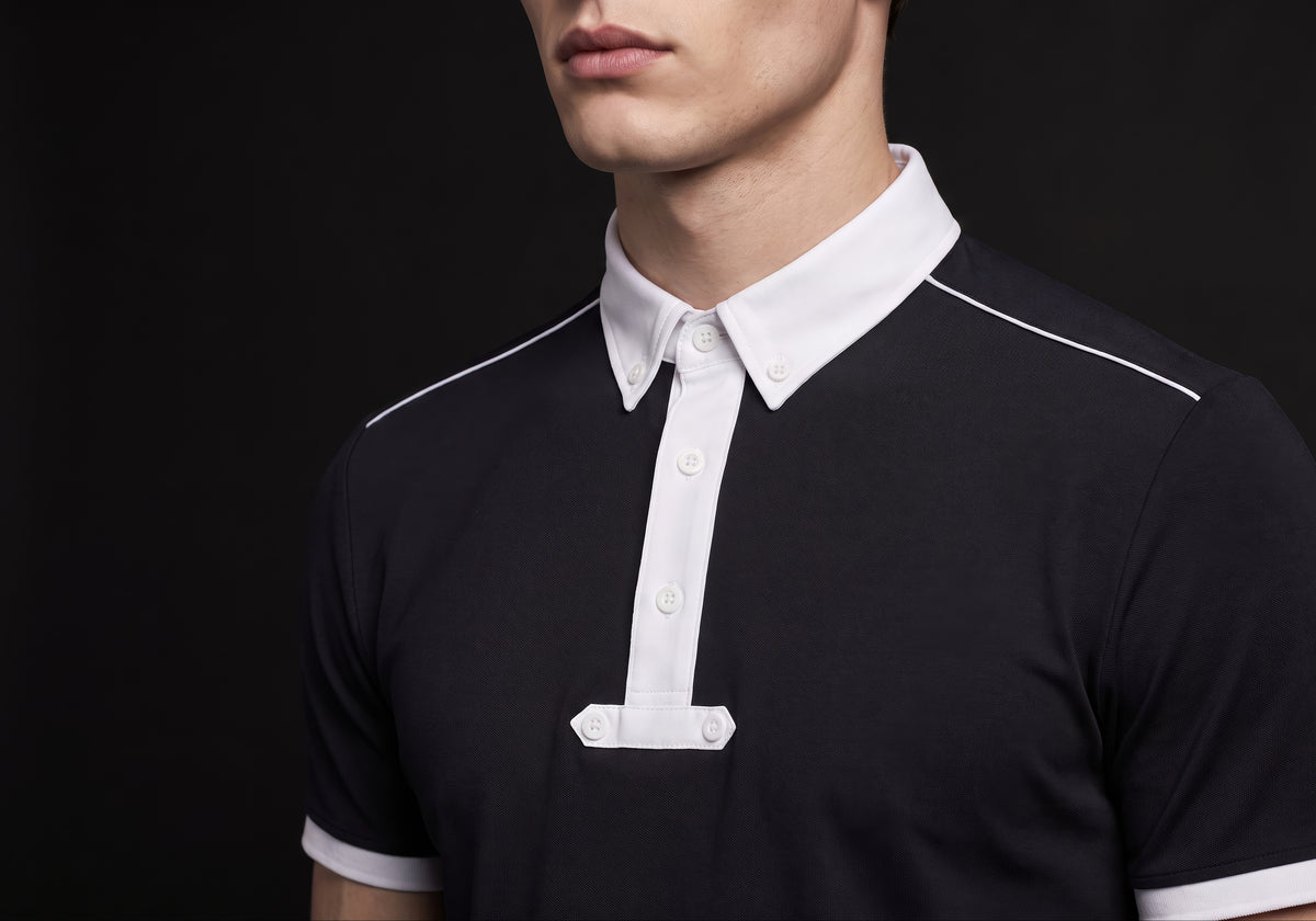 Velmurax men's knit riding polo shirt in black, in a close detail shot on the model