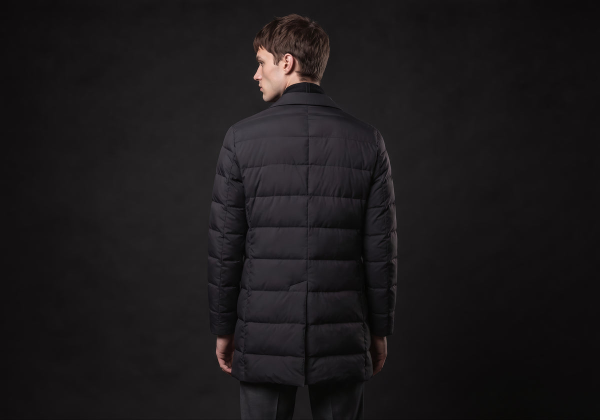 Velmurax men's quilted down coat in black, seen from the back on the model, showing the back of the garment