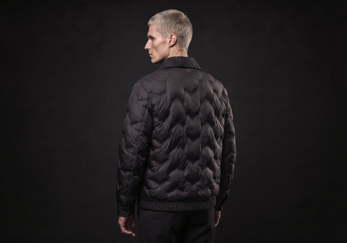 Velmurax men's quilted padded jacket in black, seen from the back on the model, showing the back of the garment