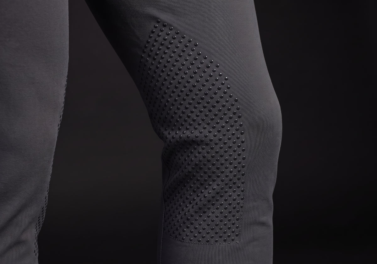 Velmurax men's riding breeches in charcoal, the grip on the inner leg up close
