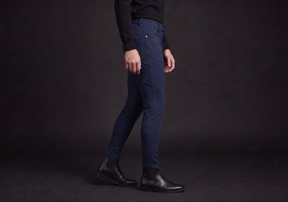 Velmurax men's riding breeches in navy, worn, in side profile