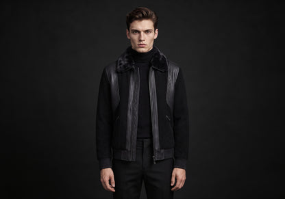 Velmurax men's short down jacket in black, worn by the model in a front view on the dark studio set