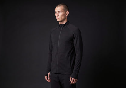 Velmurax men's stretch track jacket in black, in a three-quarter view on the model on the studio set
