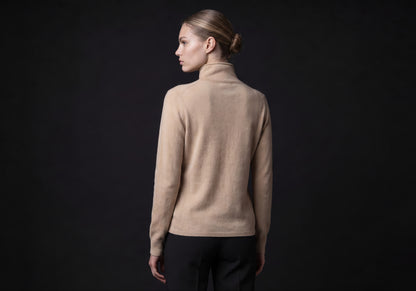Velmurax mock neck cashmere cardigan in beige, seen from the back on the model, showing the back of the garment
