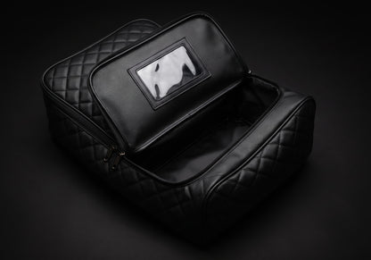 Velmurax quilted boot and helmet bag in black, opened to show the inside
