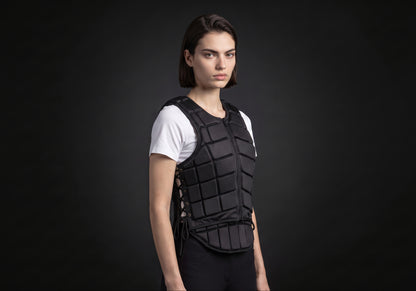 Velmurax riding body vest in black, in a three-quarter view on the model on the studio set