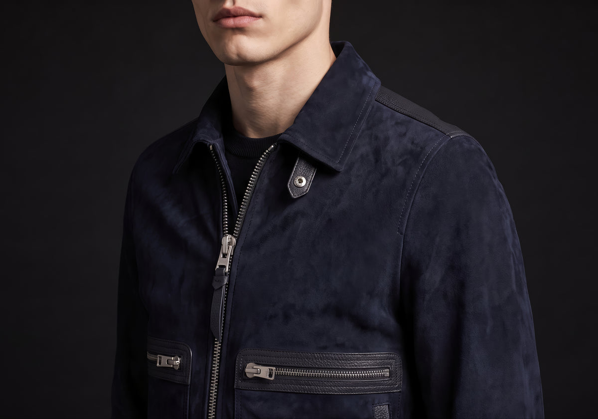 Velmurax short pilot jacket in navy, in a close detail shot on the model