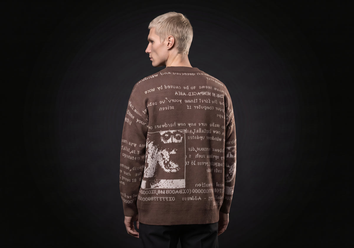 Velmurax text jacquard cardigan in brown, seen from the back on the model, showing the back of the garment