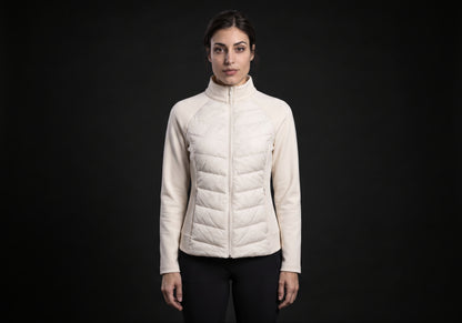 Velmurax women's down riding jacket in ivory, worn by the model in a front view on the dark studio set