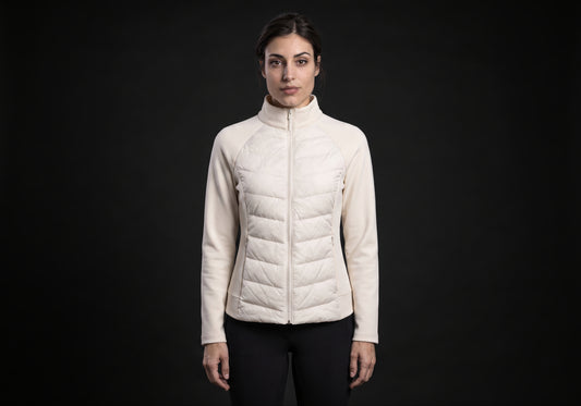 Velmurax women's down riding jacket in ivory, worn by the model in a front view on the dark studio set
