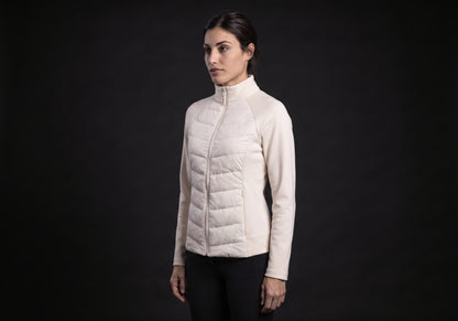 Velmurax women's down riding jacket in ivory, in a three-quarter view on the model on the studio set