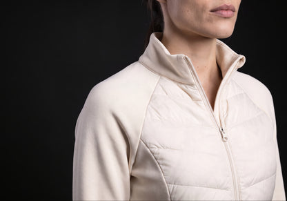 Velmurax women's down riding jacket in ivory, in a close detail shot on the model