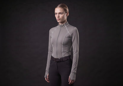 Velmurax women's long-sleeve riding top in gray, in a three-quarter view on the model on the studio set
